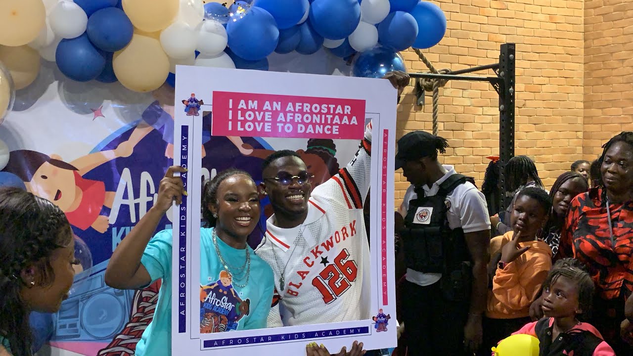 Champion Rolie having a good time with Afronitaa & Abigail Displays At Afro Star Kids Academy Launch