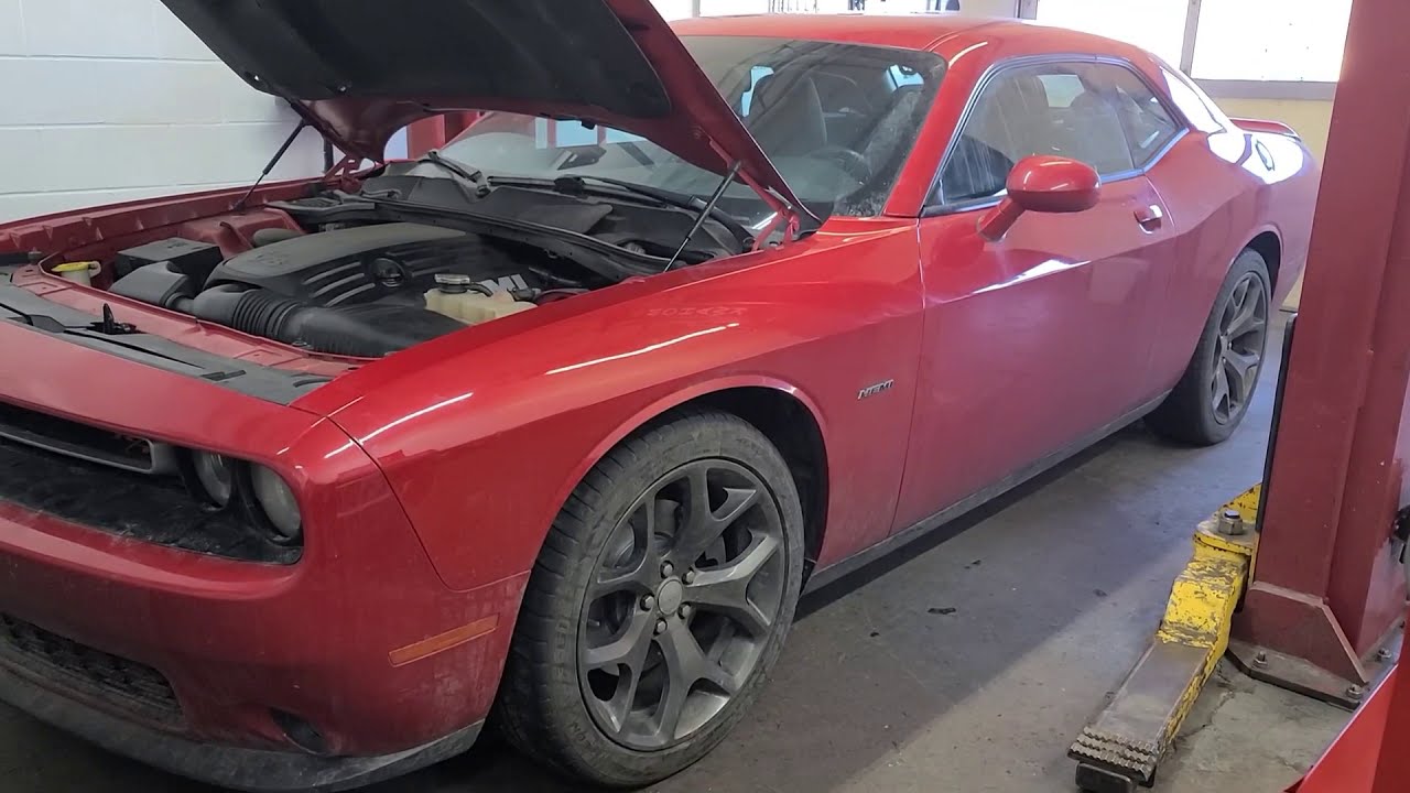 Front and Rear Brake Pads and Rotors on a 2015 Dodge Challenger