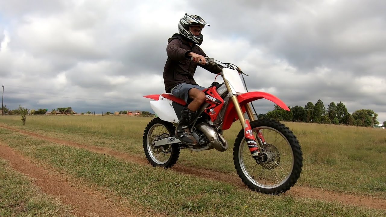 Revving Up the Power Band: Unleashing the Roar of a Honda CR 125R Dirt Bike.