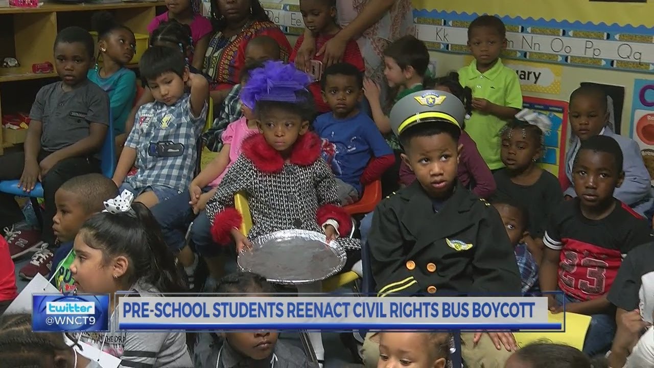 Children re-enact Rosa Parks bus scene in honor of Black History Month