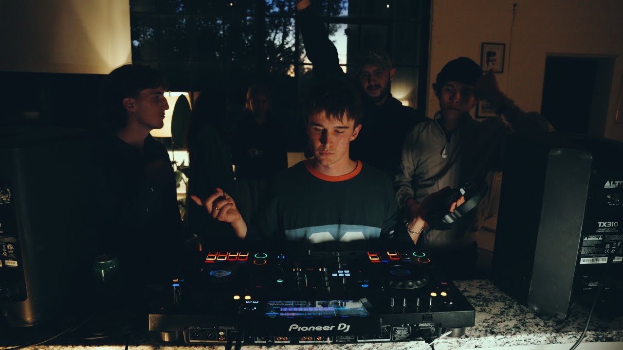 mixing tunes at sunset in my living room