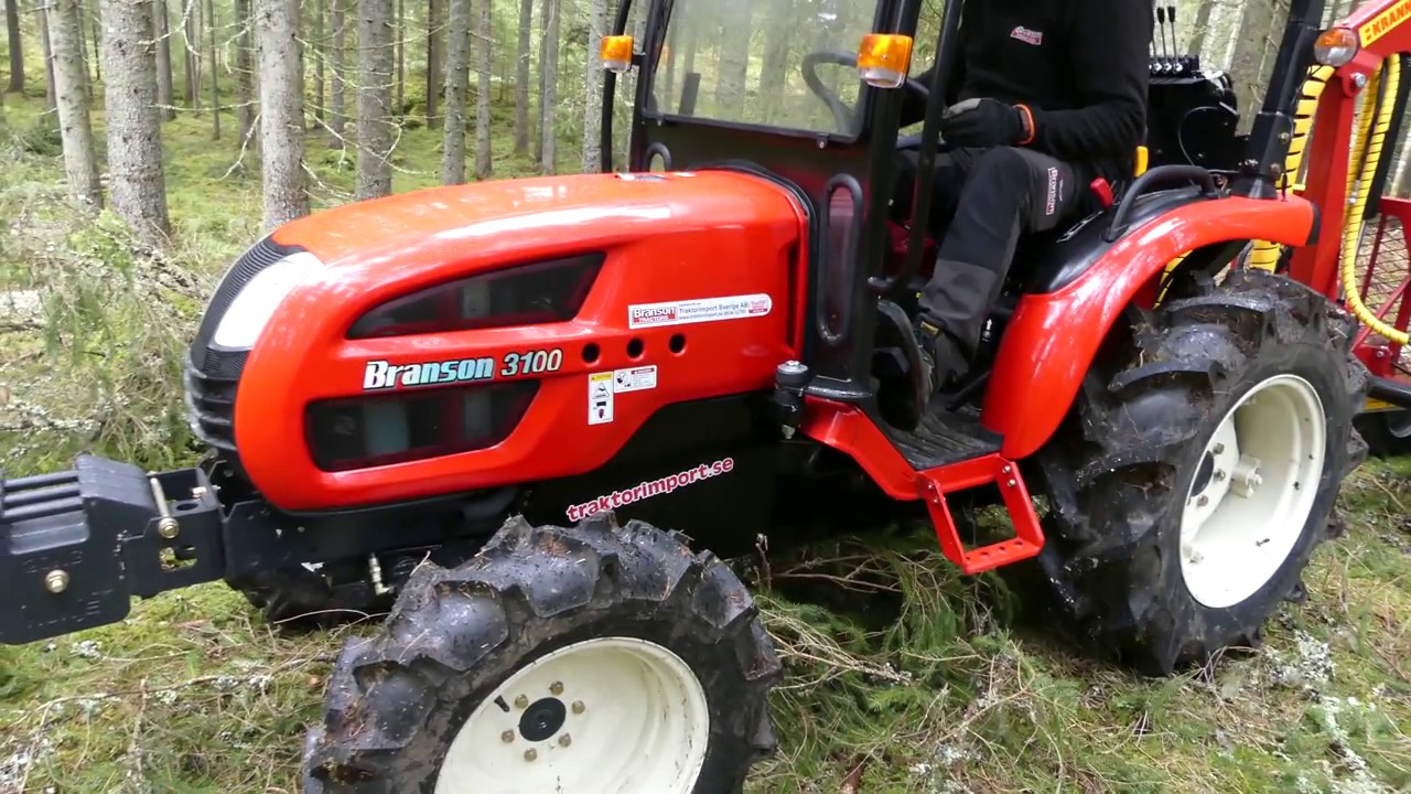 Branson 3100 kompakttraktor med Kranman skogsvagn