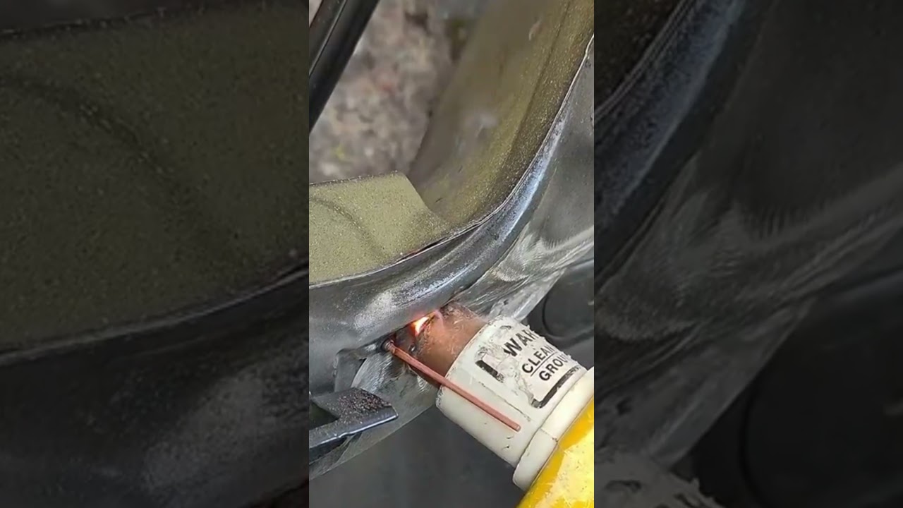 a muffler that is being coated using a special coating