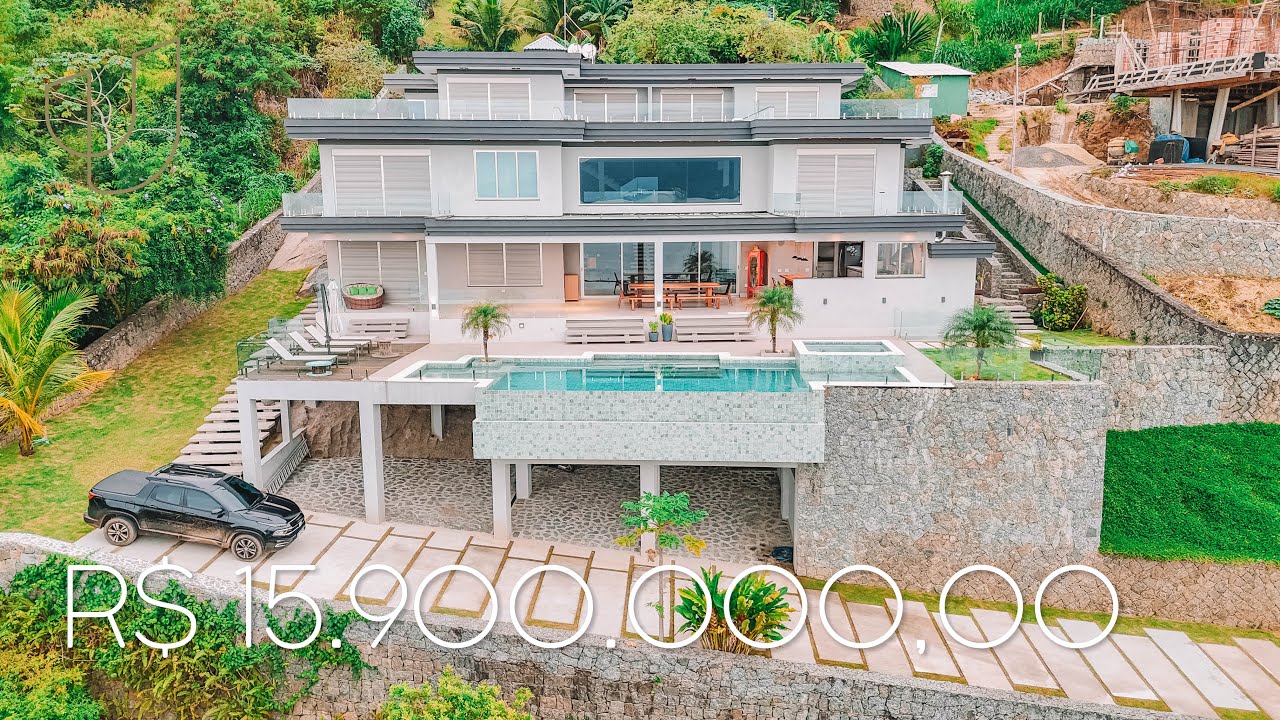 MANSÃO DE LUXO COM ARQUITETURA EM MEIO AS ROCHAS COM 7 SUÍTES EM FRENTE AO YACHT CLUB - ILHABELA/SP