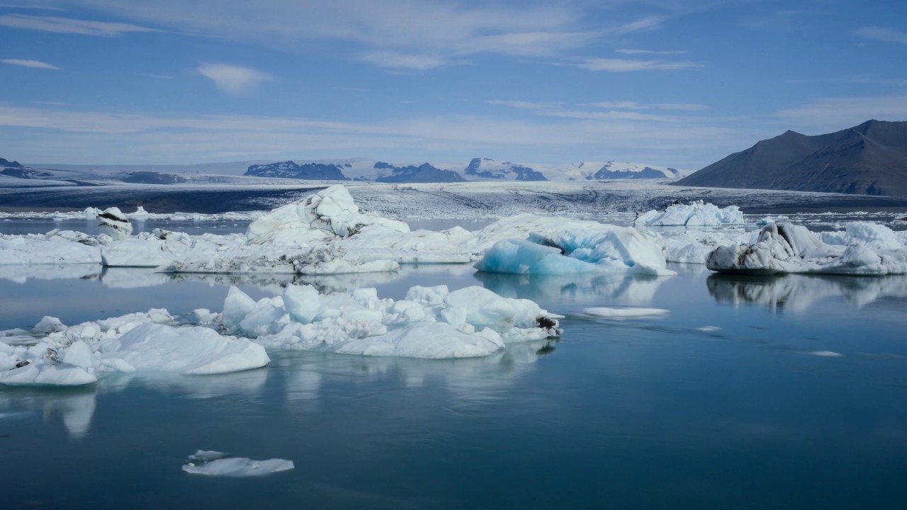 Timelapse of icebergs moving in glacial lagoon, meltwater from Vatnajokull glacier, Iceland