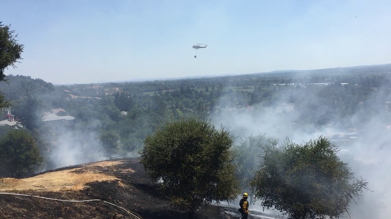 Crews battle vegetation fire in Healdsburg