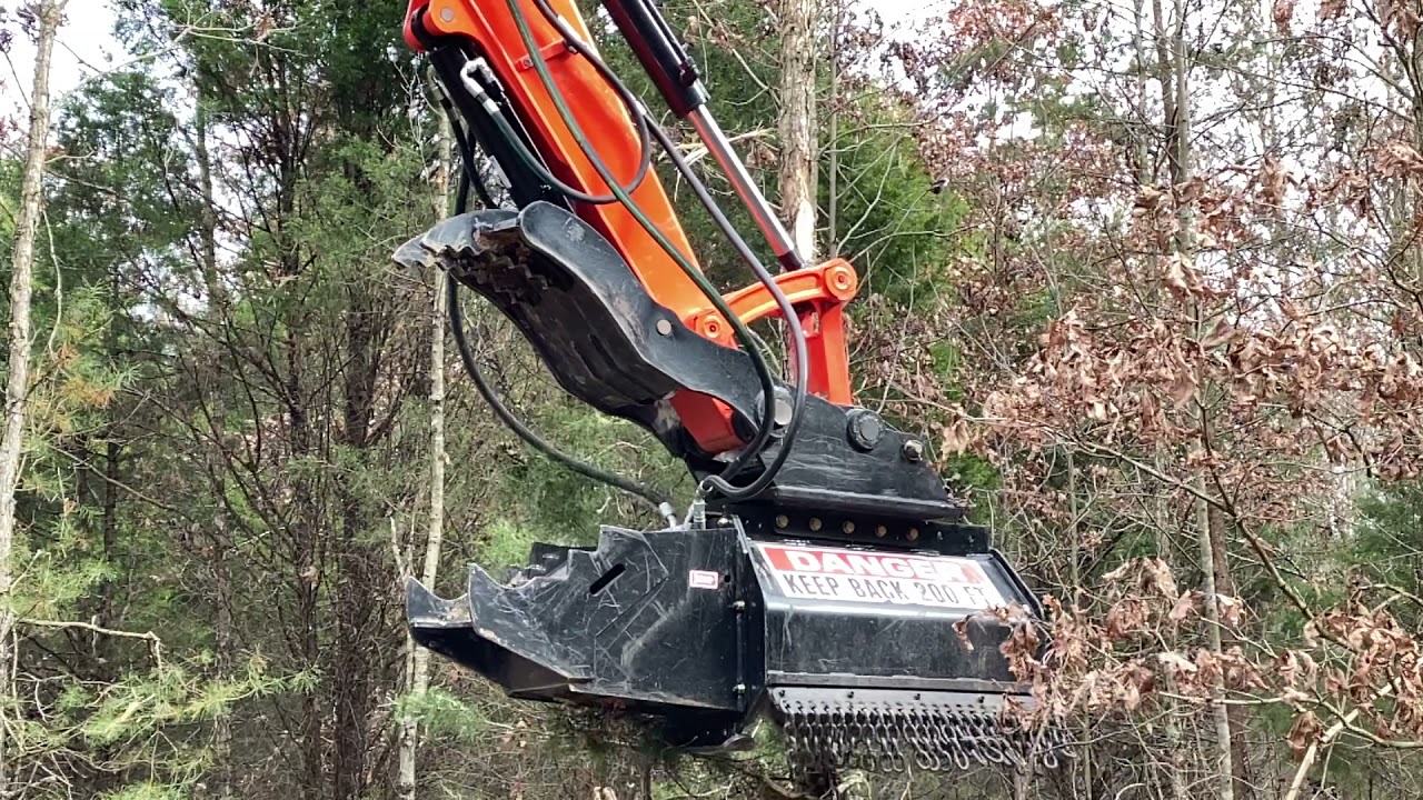 Brown Bronto Raptor mulcher head in slo-mo