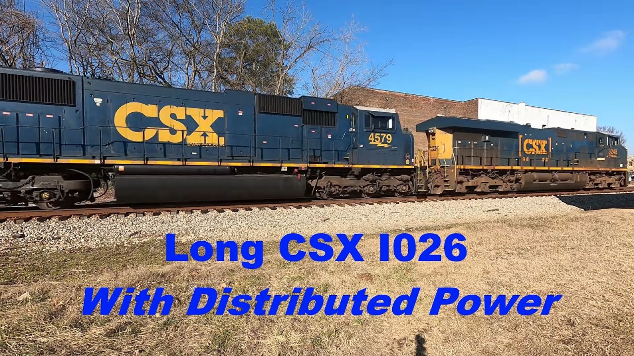 Long CSX I026 Container / Piggyback Trailer Train with Distributed Power - 3428, 4579, 5207