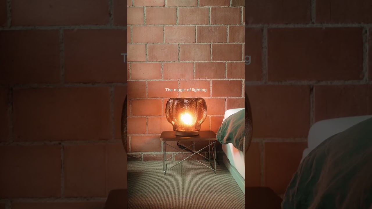 Let lighting transform your space 🤎 #MidCenturyModern