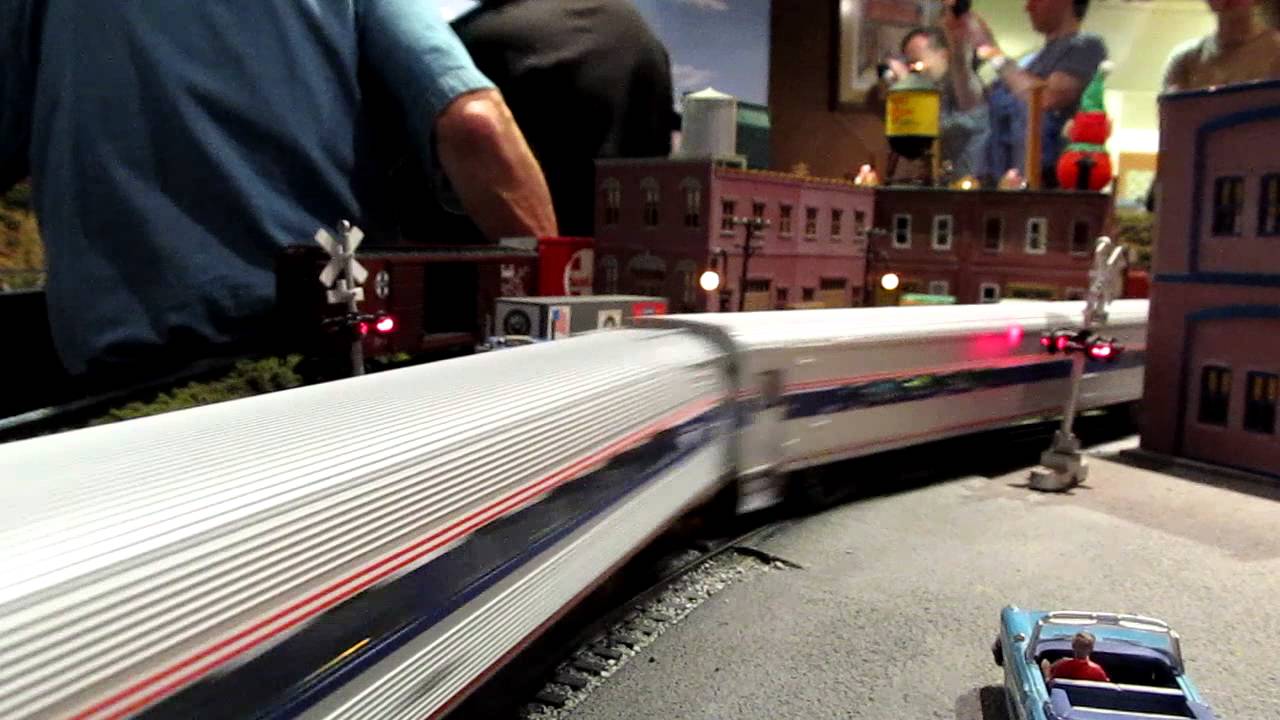 My Lionel Amtrak Amfleet End Car #9646 Flies Through a Station 12-31-2011