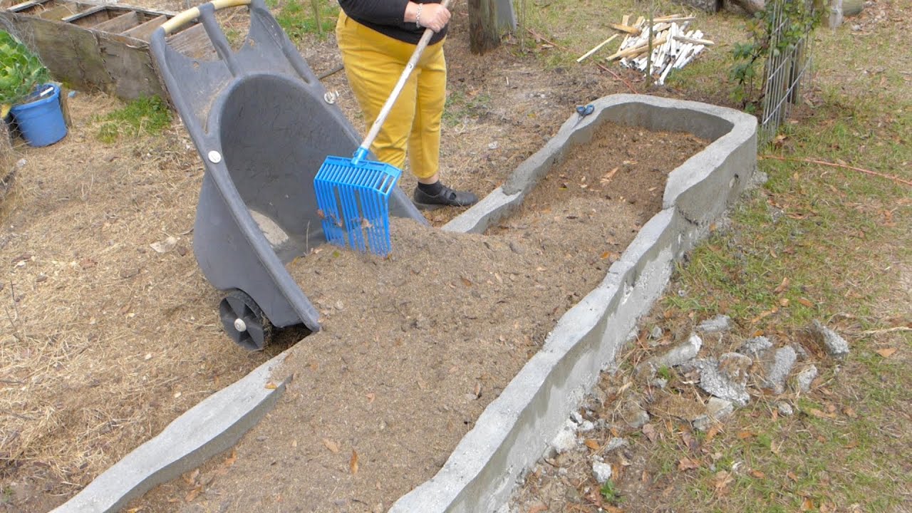 Preparing the soil for my heirloom seed garden. Don't dig down, build up!
