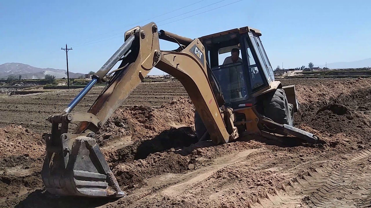 Maniobras con retroexcavadora/Backhoe tricks