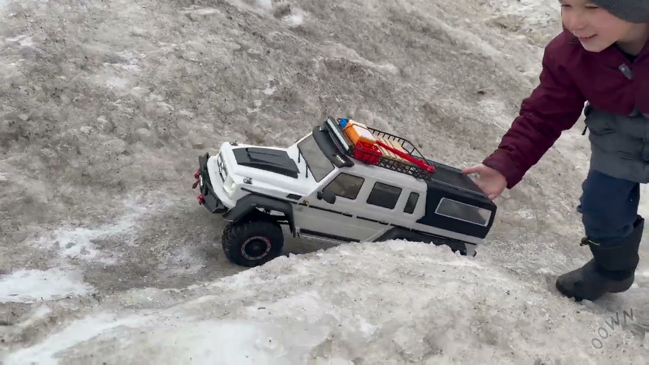 Snowbank Crawling With Logan