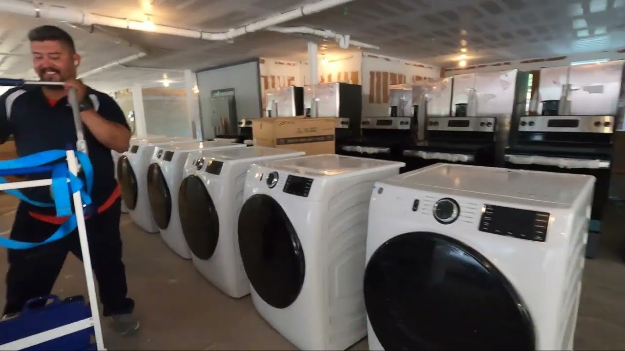 Delivering appliances upstairs in Dallas, TX by Rescue Moving Services | Appliance Delivery Company.