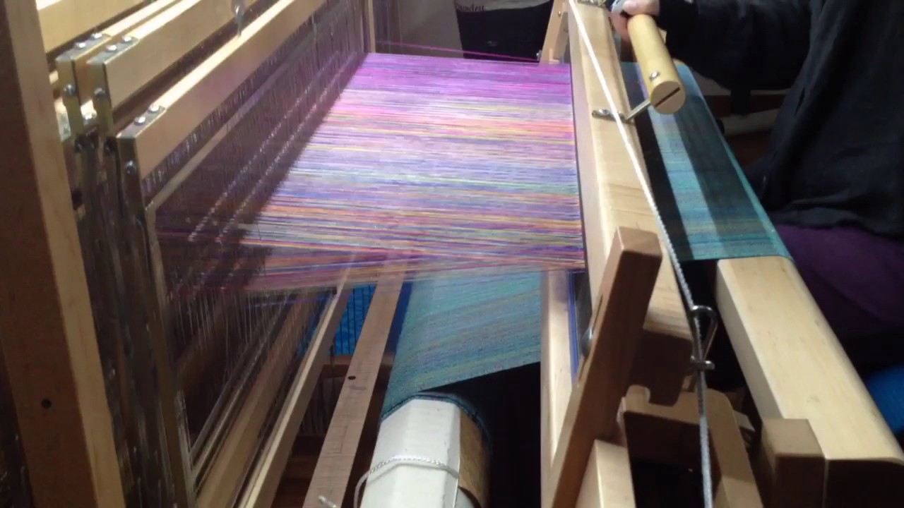 Weaving with a flying shuttle.