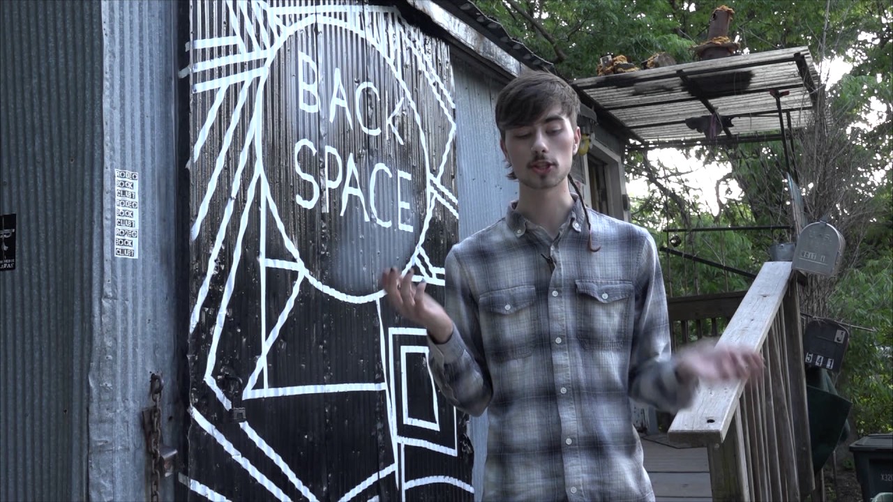 ECCENTRIC PERCUSSIONIST PLAYS BACKSPACE