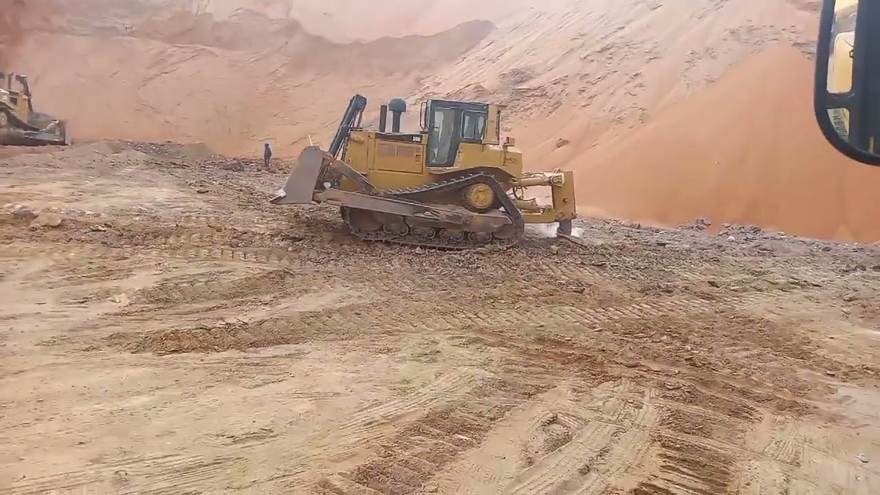 CAT D8T DOZER RIPPING THROUGH HARD ROCKS