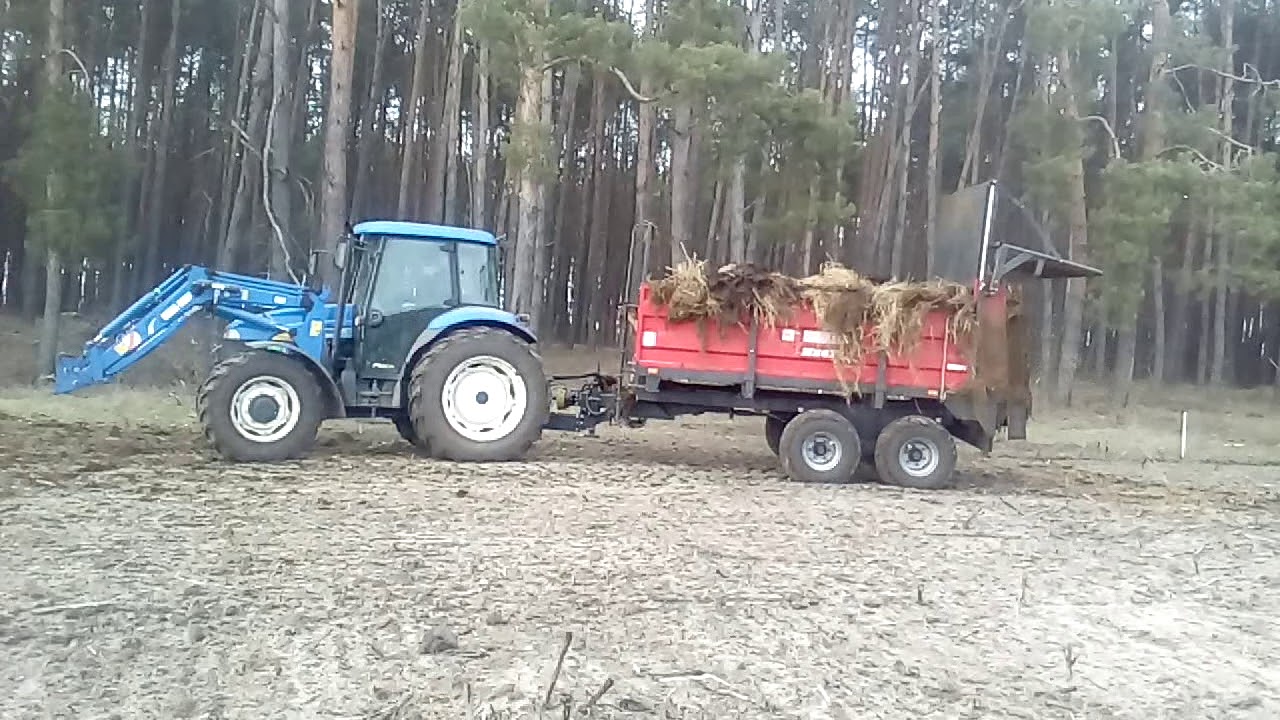 Ładowanie obornika John Deere & New Holland