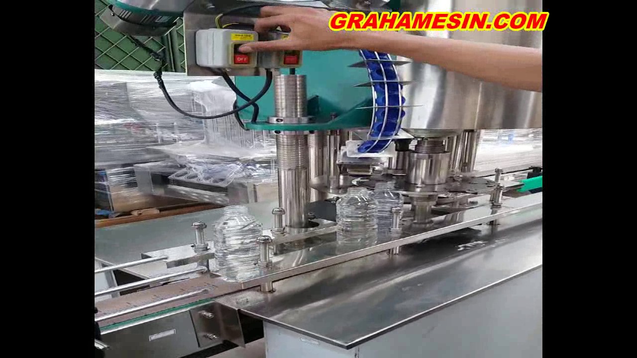 Sistem Kerja Mesin Filling Cairan Pengisi Air Kedalam Botol Kapasitas Industri