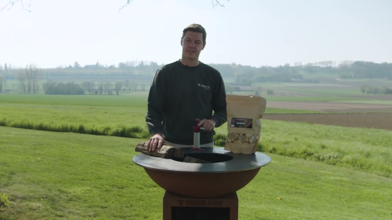 Hoe steek ik de plancha BBQ aan?