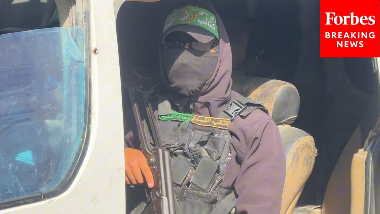 Armed Hamas Members Accompany Red Cross Teams During Recovery Efforts In Gaza