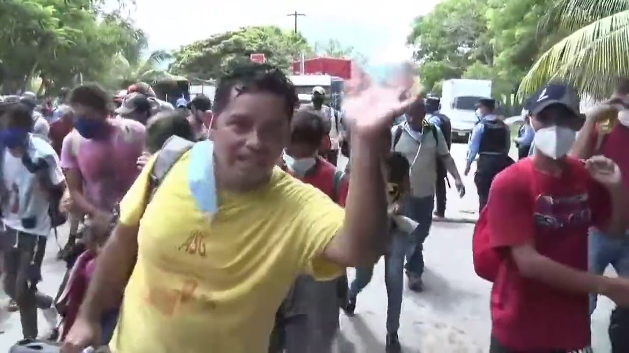 WATCH: Migrant caravan BARRELS through police barricade, heads towards U.S.