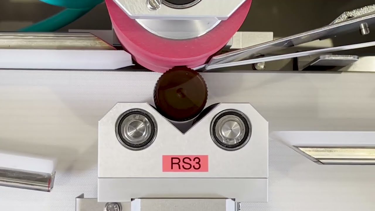 Bottle and vial labelling system - VRM