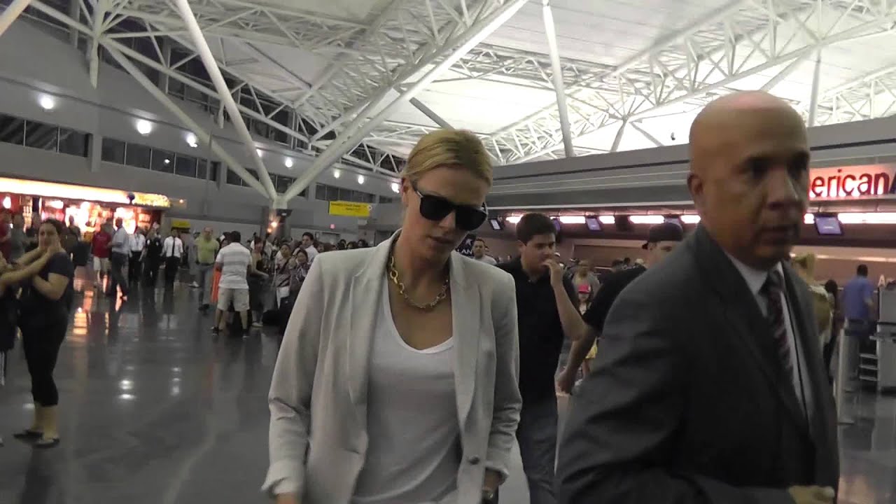Charlize Theron Arriving NYC Ignoring Fans & And Showing Mean Faces