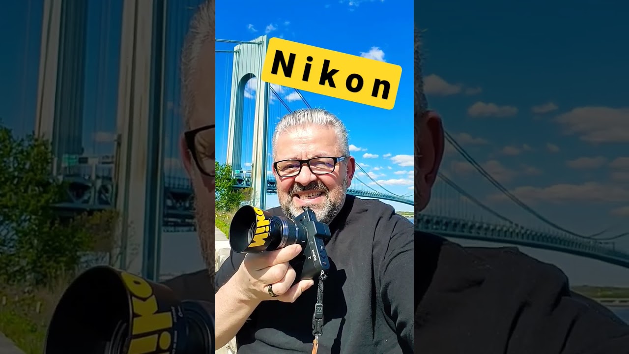 Беззеркальная фотокамера Nikon 1 V1 для профессиональной фотографии с объективом Nikkor 30–100 мм...