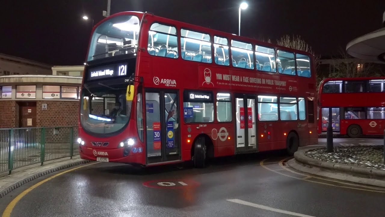 Buses after dark at Turnpike Lane station February 2021