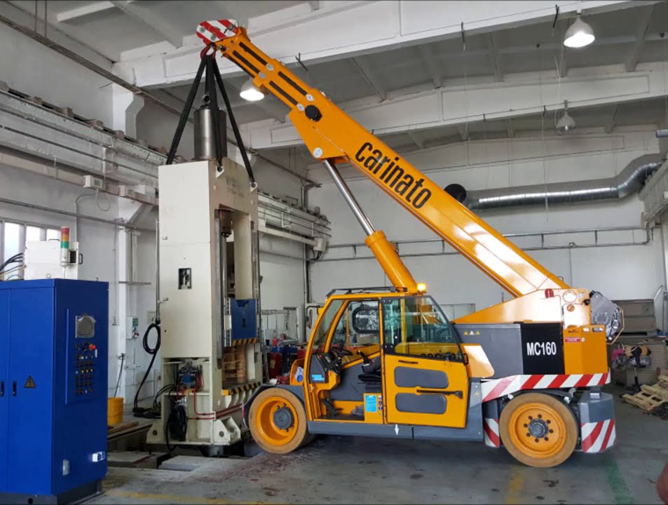 JMG model MC160 lifting and positioning a press of 14,8 tons