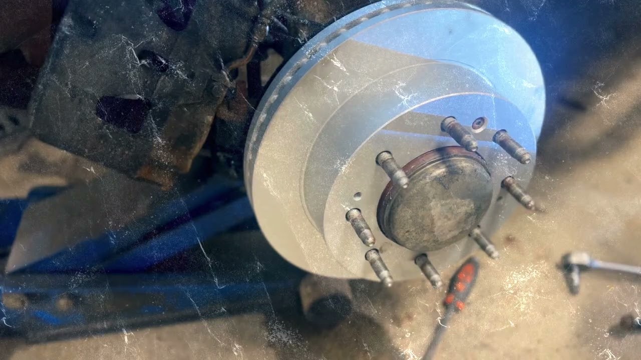 Installing rotor screw hold down 
