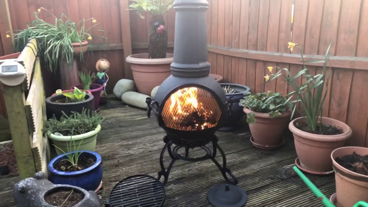 Cooking T-Bones steaks on a Chimenea and BBQ Grill.