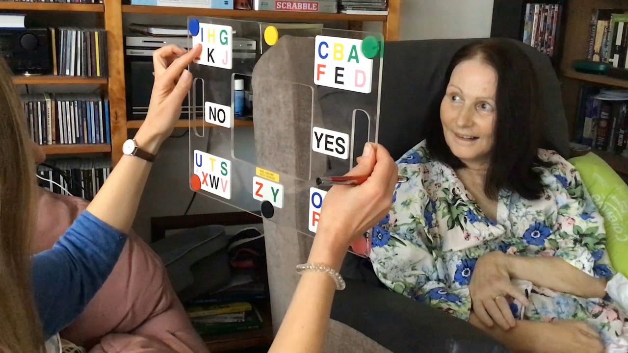 Rosemary: eye pointing to letters on a Frenchay E-tran frame