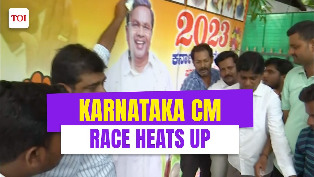 Karnataka CM MYSTERY continues: Supporters pour &lsquo;Nandini Milk&rsquo; on Siddaramaiah&rsquo;s posters