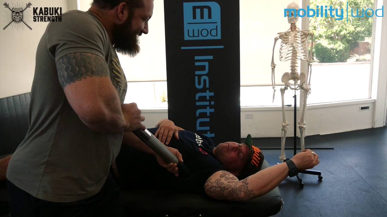 Kelly Starrett & Duffin using Boom Stick to release triggers & fascial shearing#triggerpointtherapy