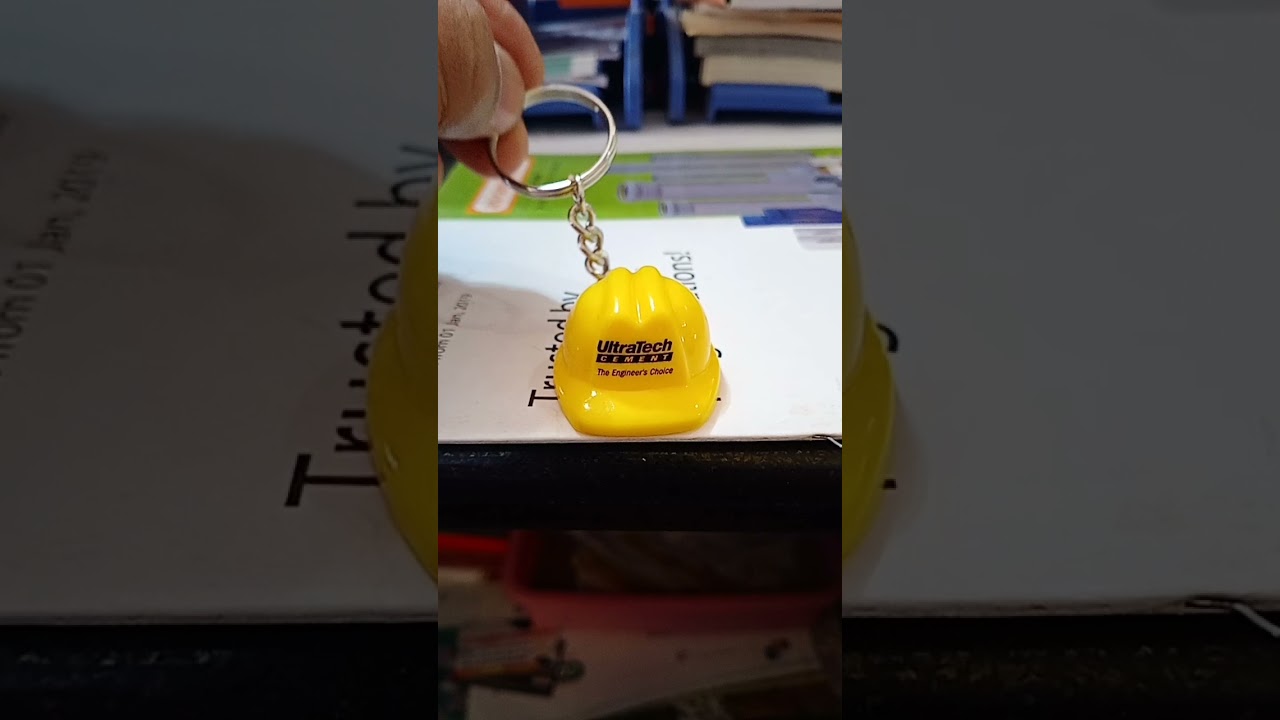 ultratech cement promotional keychain.