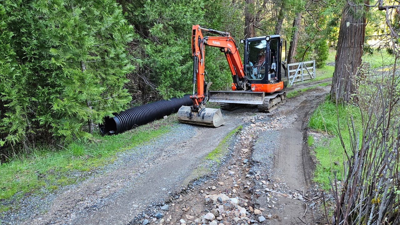 Budget flood damaged road & culvert repair with the Kubota KX 040 4 excavator