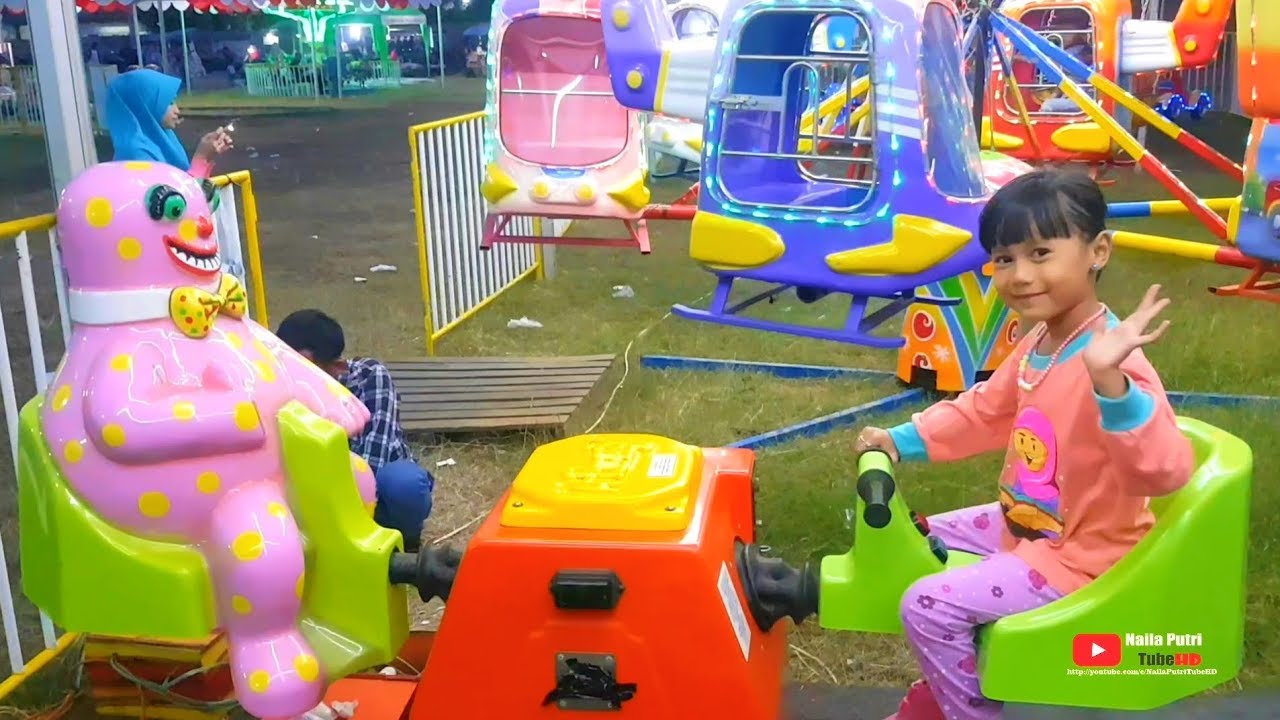 Naik odong-odong koin dan komedi putar kuda DI PASAR MALAM