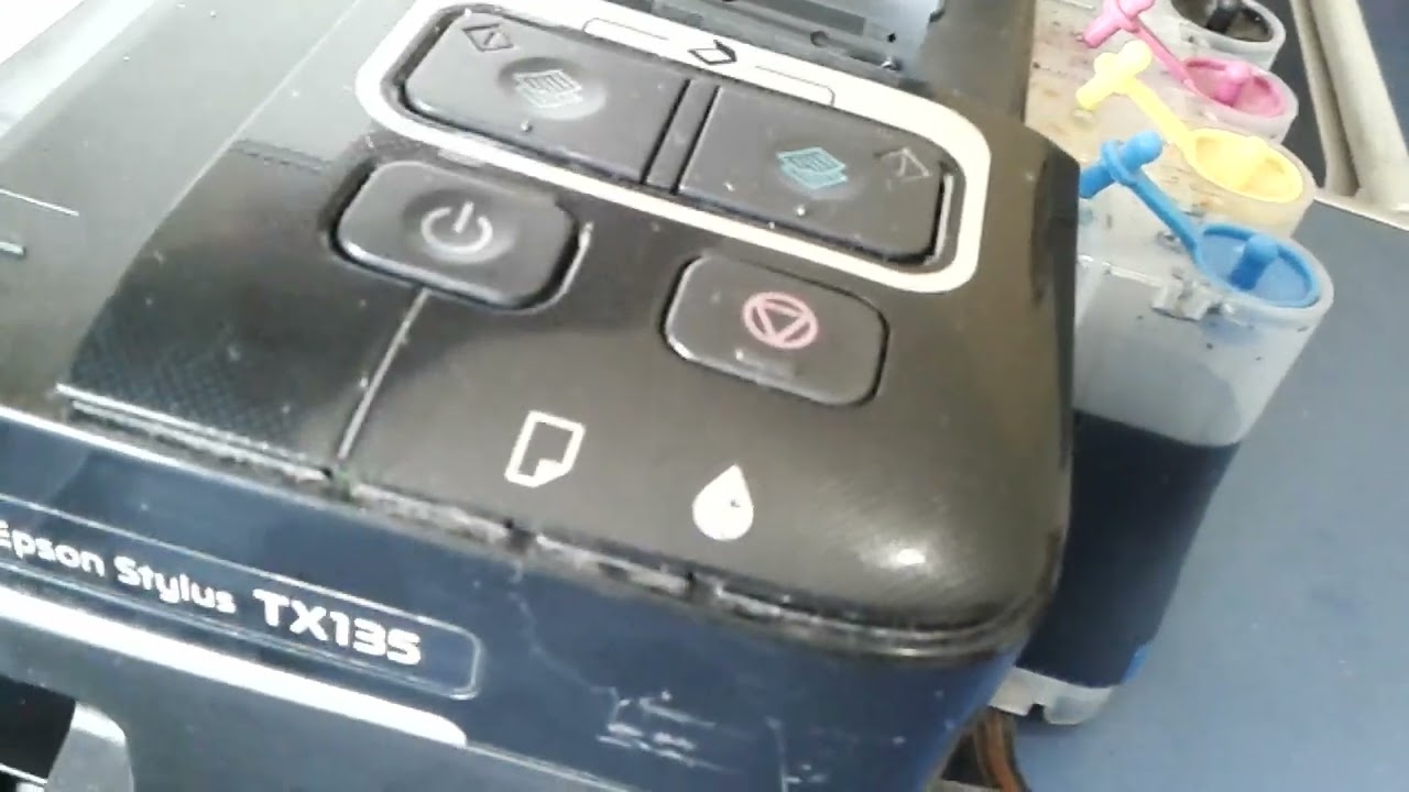 Impressora Epson Tx135 Tx125 parada não imprime, veja como fazer a limpeza