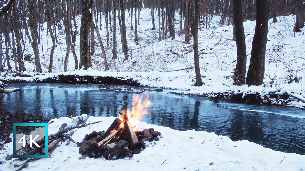 4 hours - Winter Campfire by the River | Snowy Forest Ambience | Gentle Stream | Campfire Sounds 4K