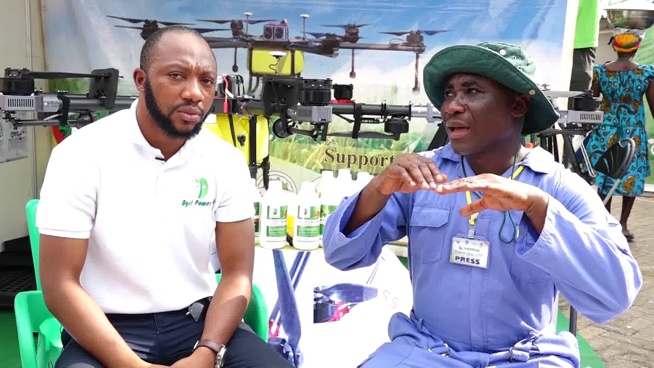 Agripower Ghana Limited Officer explaining how to use Drone with EduanePa Ferfilizer