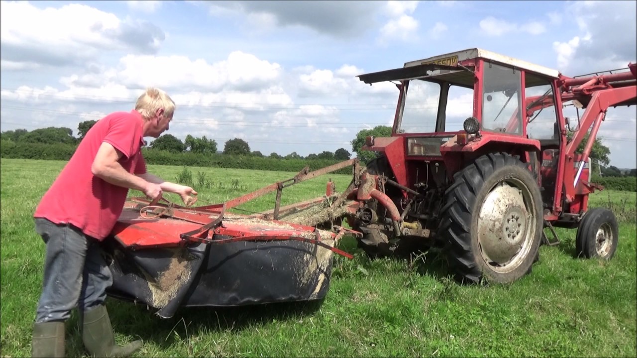 Topping blackthorn with the MF 265 and mower