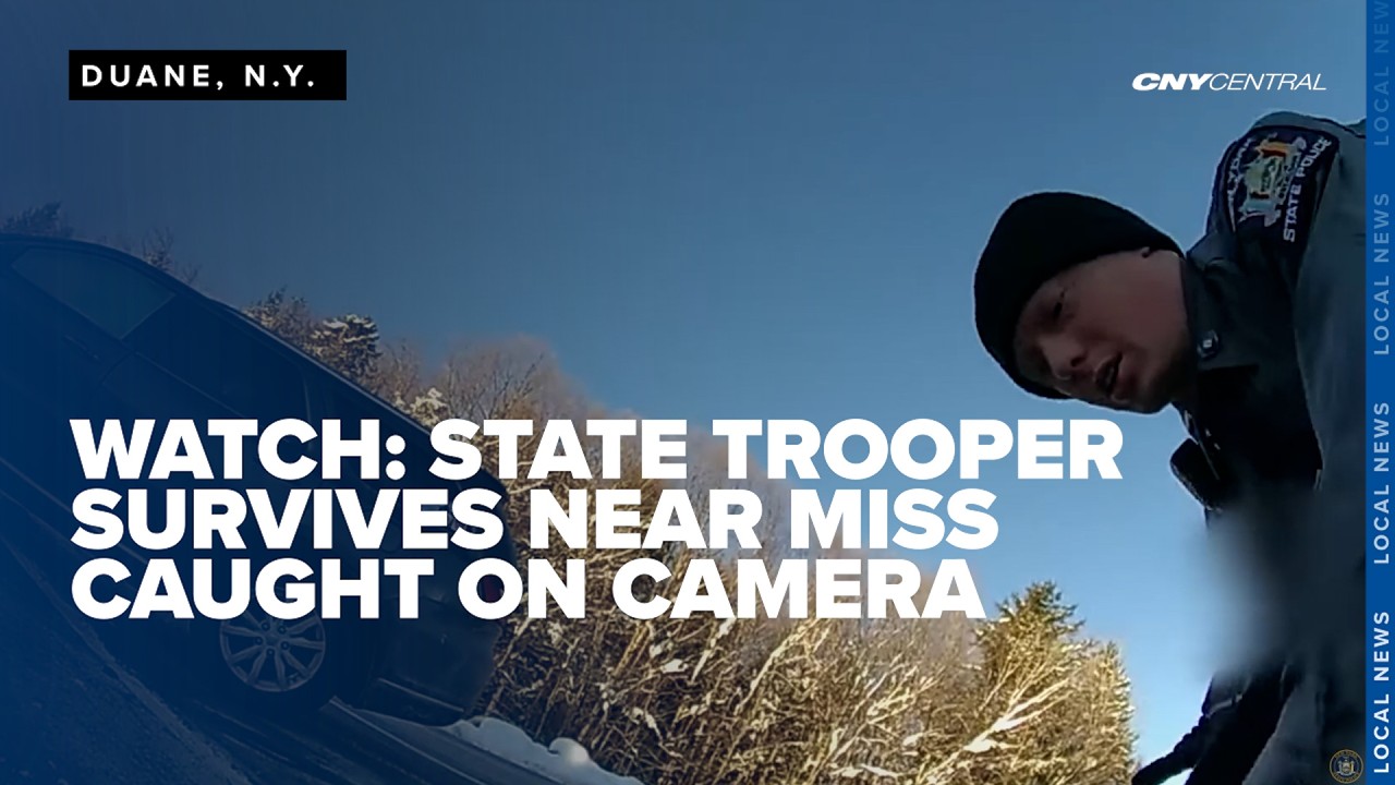 Caught on camera: State Trooper narrowly avoids being hit by vehicle