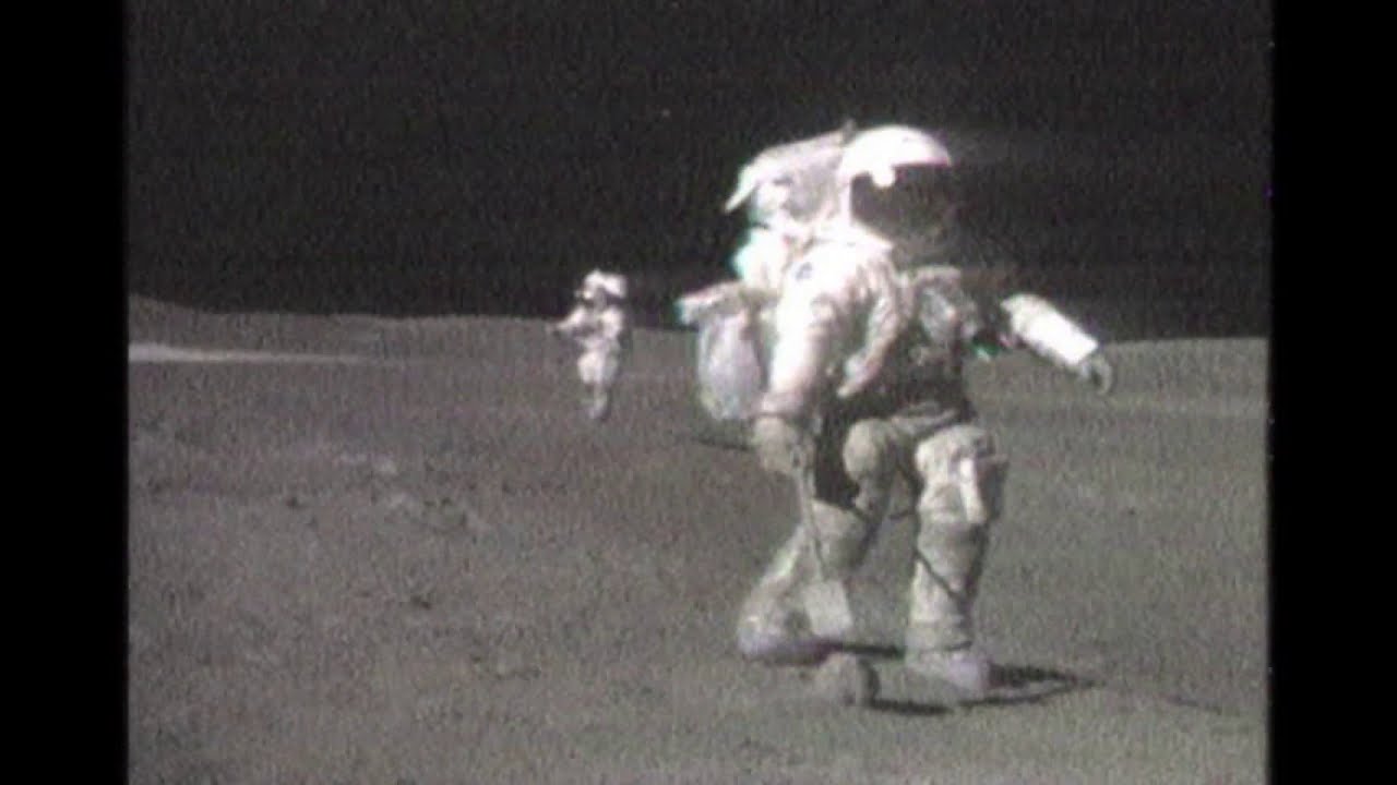 Astronaut Grabs A Big Moon Rock, Then Runs Off With It.