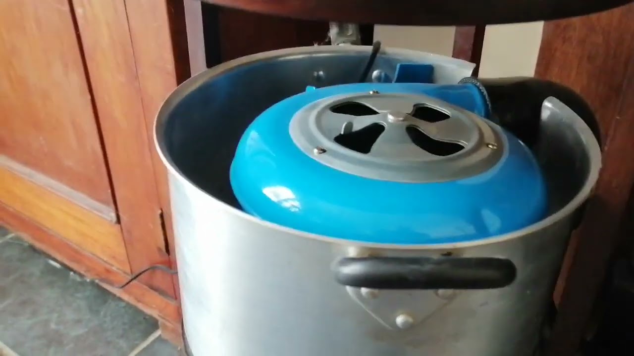 Outbacker Stove adapted to run on waste oil.