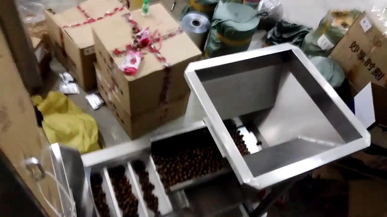 Automatic multi head net weigh filling packing machine for nuts packaging