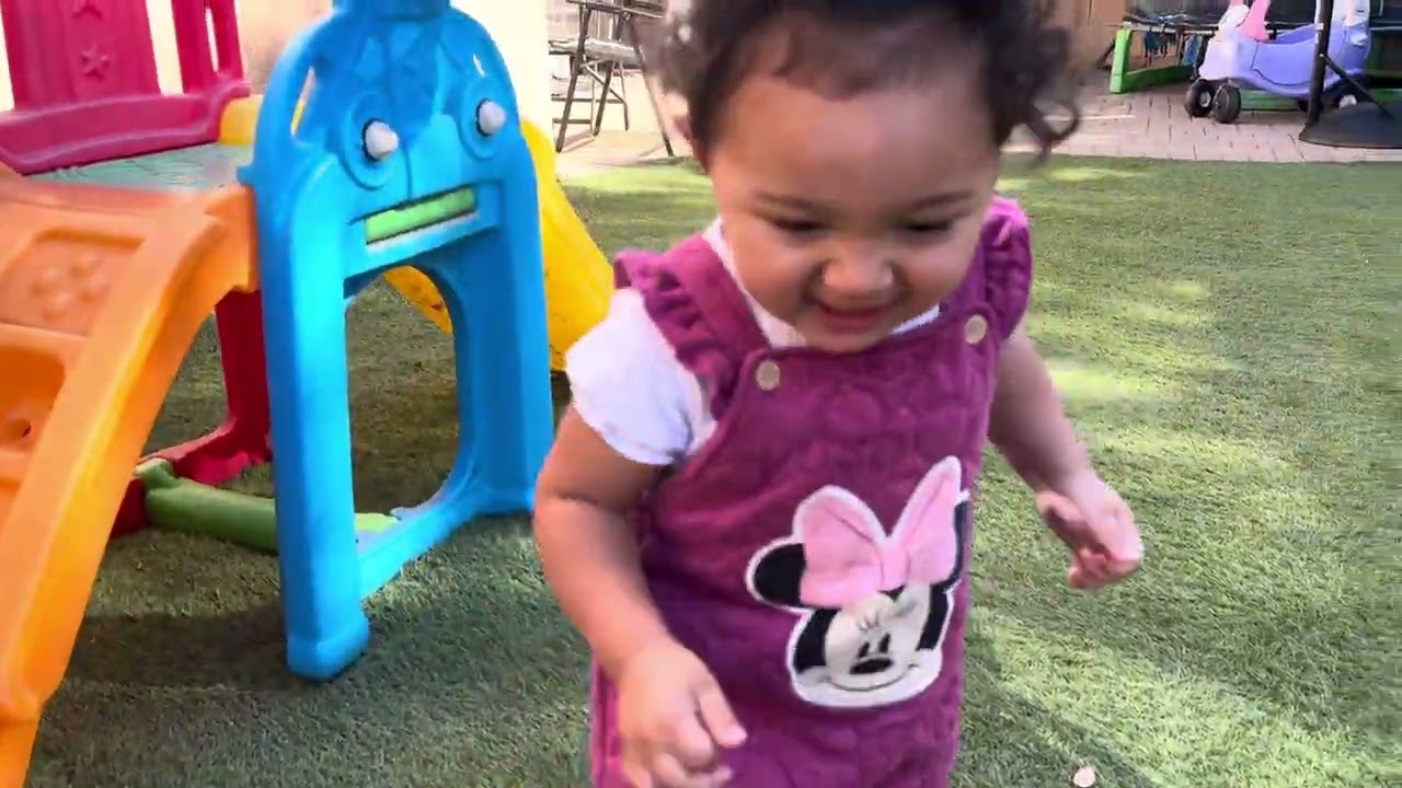 Daddy and Daughter play time. Backyard sliding with Bella. 