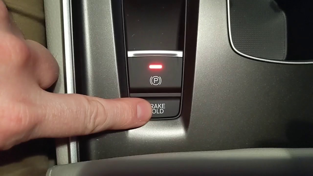 What does the Brake Hold button do?