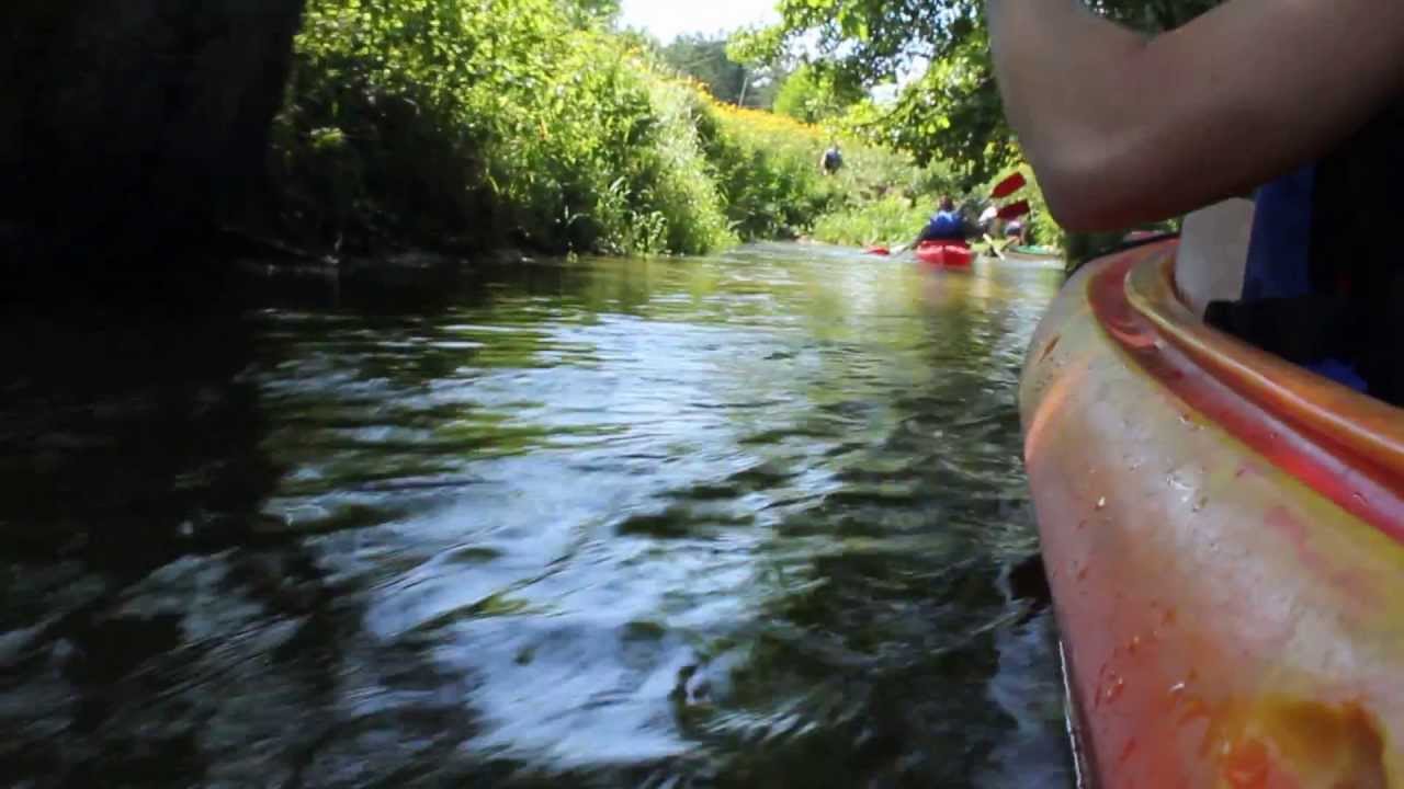Kayaking on Wieprz River, Poland.